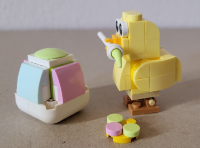 Küken mit Ei von Links